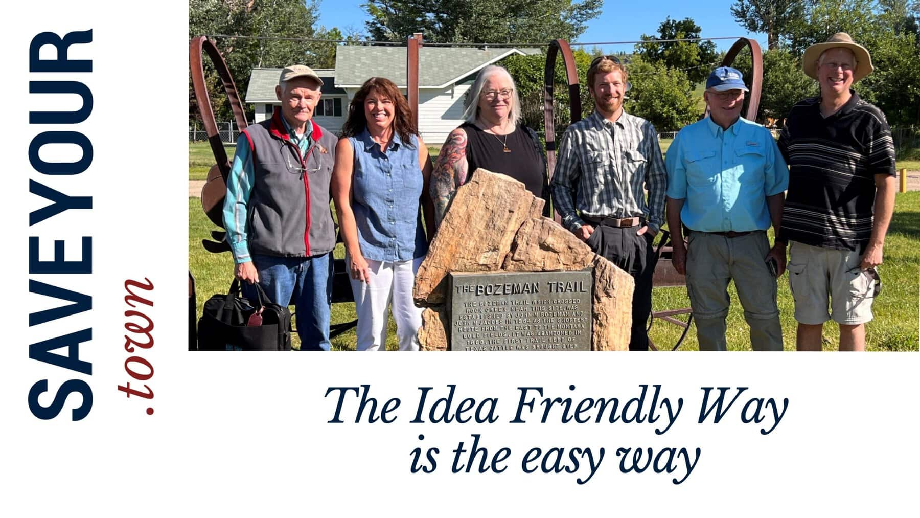 Screen capture of a slide that says, Save Your Town, The Idea Friendly is the easy way. Includes a photo of people standing near a monument on the Bozeman Trail in Montana.