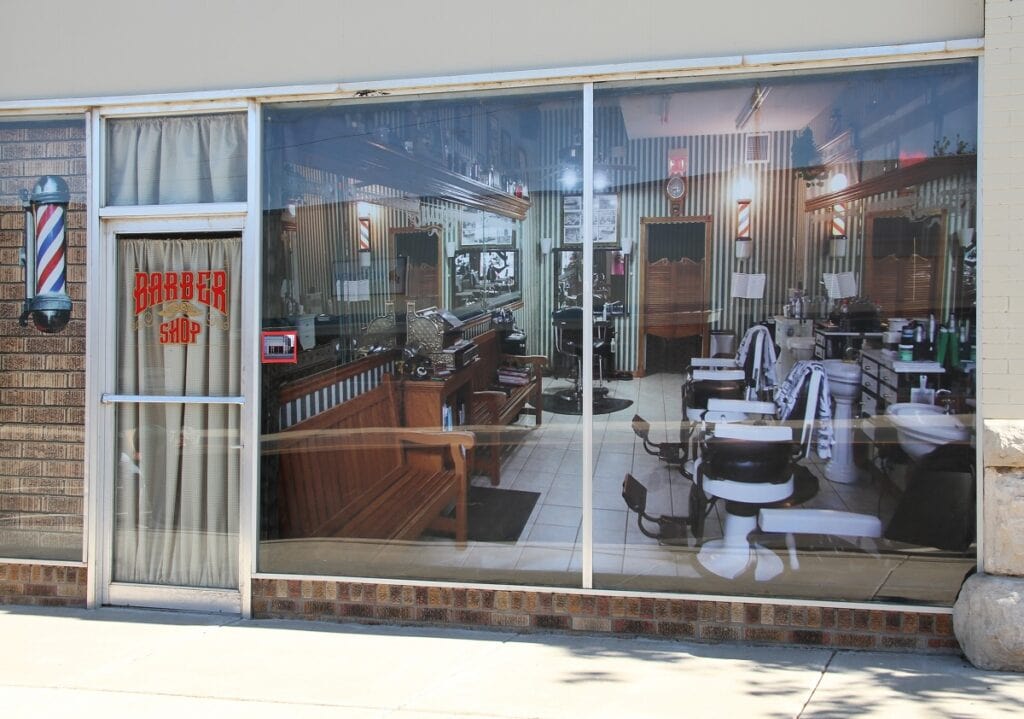 What looks like an old fashioned barber shop is actually a decal inside the shop windows. 